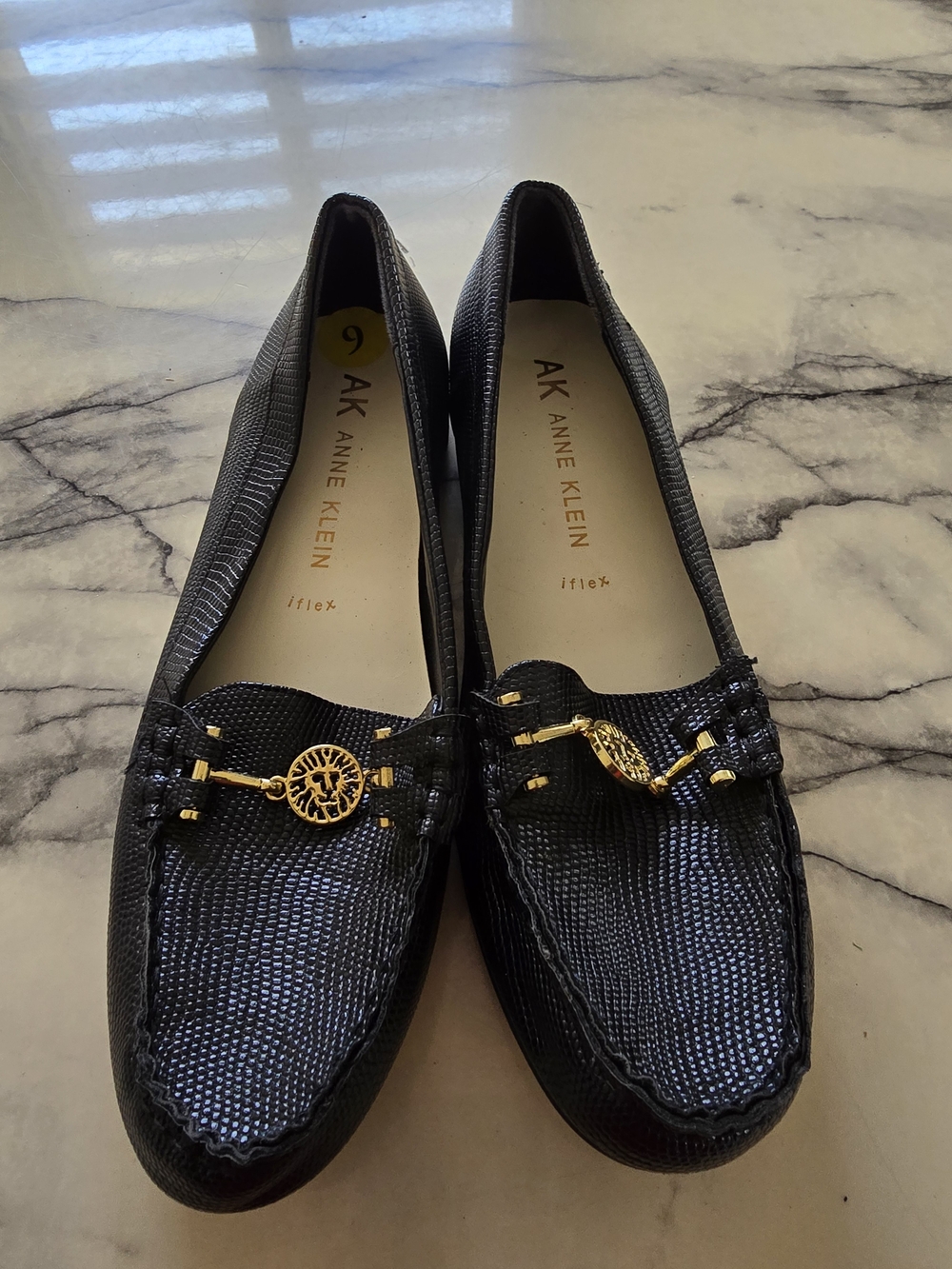 Anne Klein Black Textured Moccasin Loafers with Gold Accent